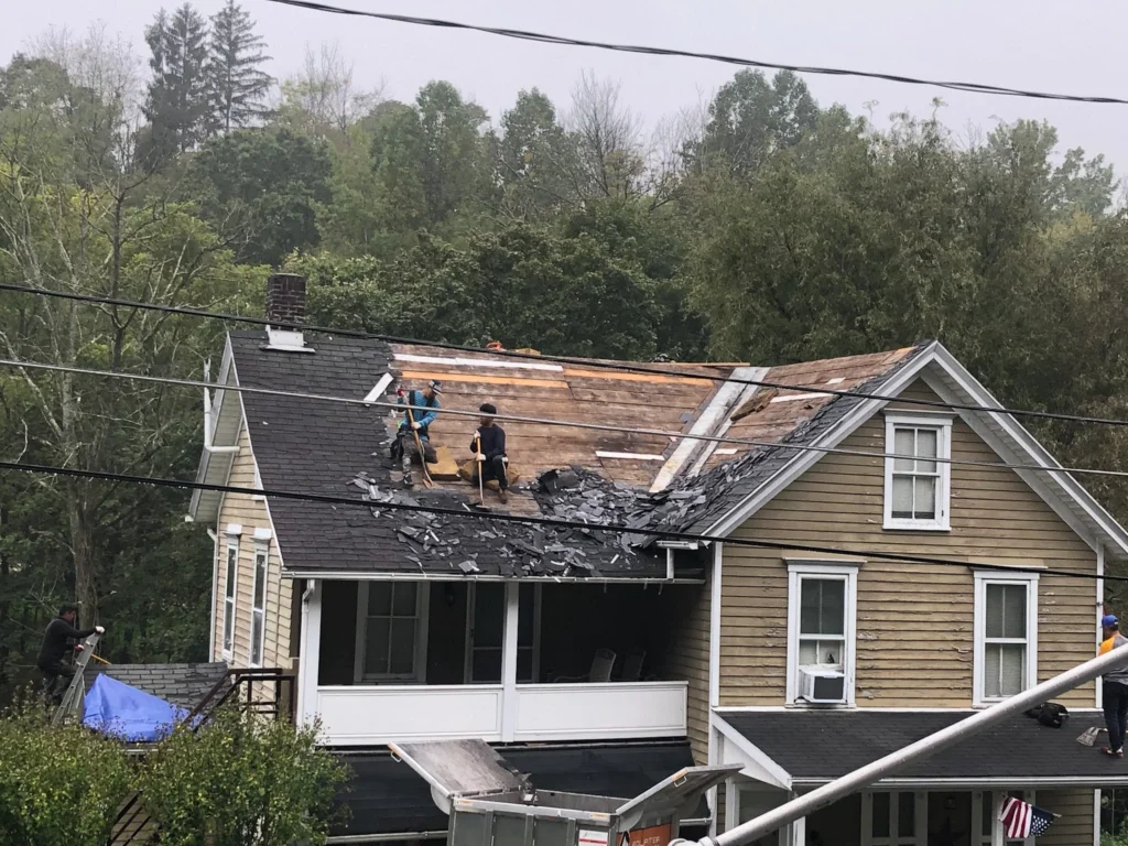 Roofers Removing Shingles from Lehigh Valley Residence