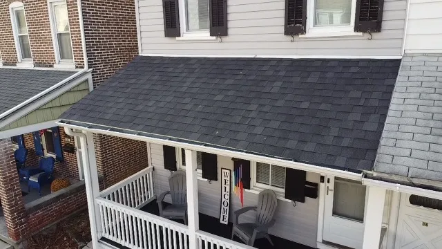 A Birds-Eye View of a Porch with a Shingle Roof